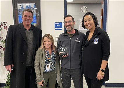 Nurse Brian with Superintendent, Principal and Health Director 